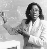 George Mason University physics professor Cynthia McIntyre received her doctorate from Massachusetts Institute of Technology in 1990