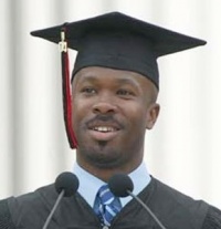 R. Erich Caulfield, president of the MIT Graduate Student Council, speaks before MIT's 138th Commencement exercises on June 4, 2004.